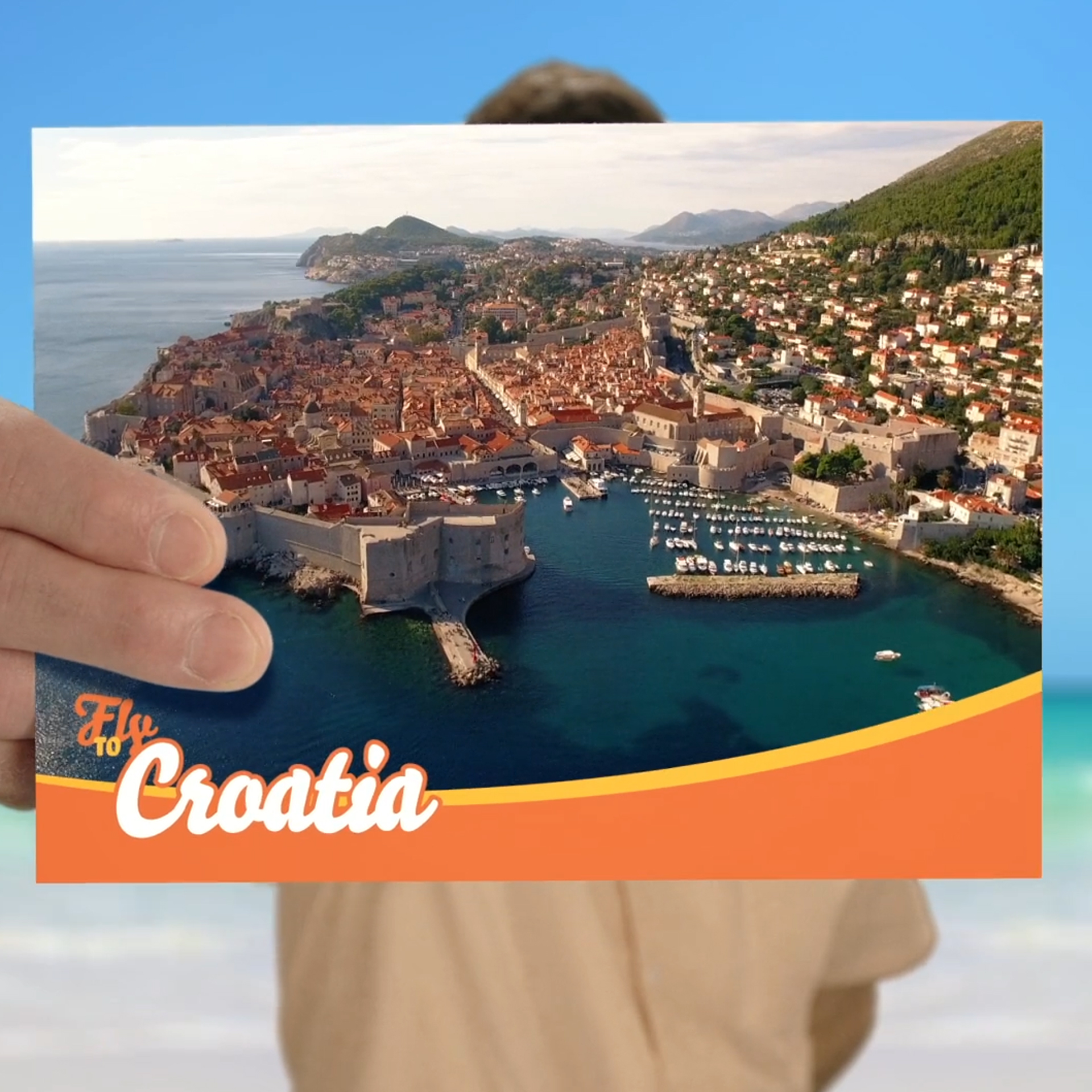 Dec hold up postcard of Croatian town